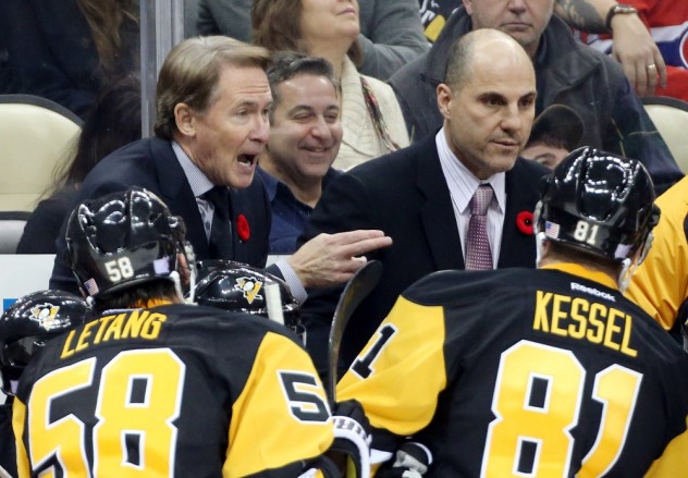 Nov 11, 2015; Pittsburgh, PA, USA; Pittsburgh Penguins head coach Mike Johnston (L) gestures as he talks to the team during a time-out against the Montreal Canadiens in the third period at the CONSOL Energy Center. The Penguins won 4-3 in a shootout. Mandatory Credit: Charles LeClaire-USA TODAY Sports