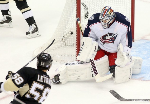 Nov 13, 2015; Pittsburgh, PA, USA; Columbus Blue Jackets goalie Sergei Bobrovsky (72) makes a save against Pittsburgh Penguins defenseman Kris Letang (58) during the second period at the CONSOL Energy Center. Mandatory Credit: Charles LeClaire-USA TODAY Sports