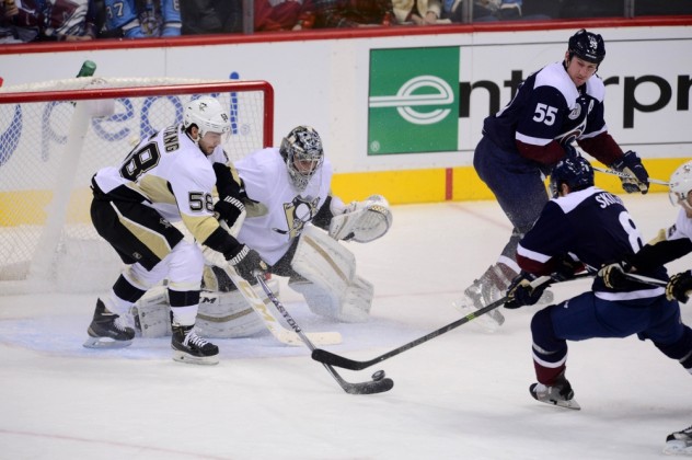 Dec 9, 2015; Denver, CO, USA; Pittsburgh Penguins defenseman Kris Letang (58) and goalie Marc-Andre Fleury (29) defend an attempt by Colorado Avalanche right wing Jack Skille (8) in the first period at Pepsi Center. Mandatory Credit: Ron Chenoy-USA TODAY Sports