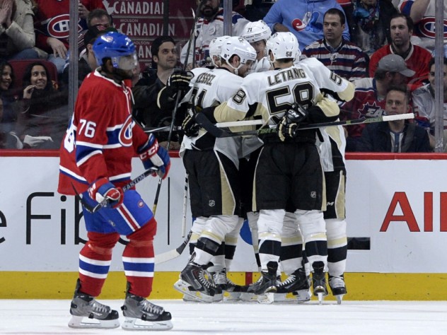 Jan 9, 2016; Montreal, Quebec, CAN; Pittsburgh Penguins forward Patric Hornqvist (72) celebrates with teammates after scoring a goal against the Montreal Canadiens during the second period at the Bell Centre. Mandatory Credit: Eric Bolte-USA TODAY Sports