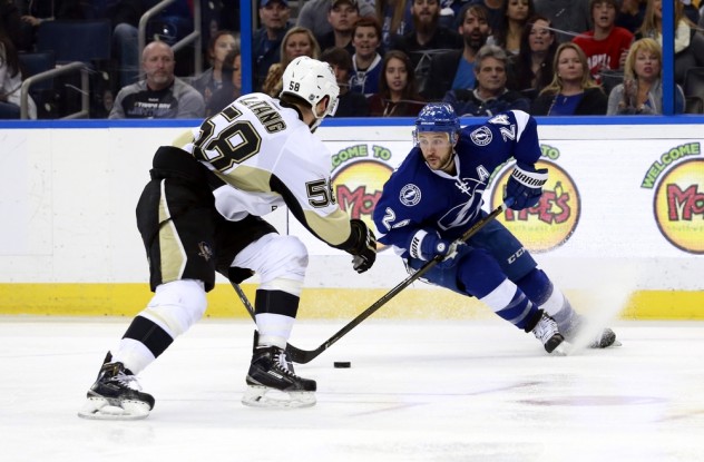 Feb 5, 2016; Tampa, FL, USA; Tampa Bay Lightning right wing Ryan Callahan (24) skates with the puck as Pittsburgh Penguins defenseman Kris Letang (58) defends during the third period at Amalie Arena. Tampa Bay defeated Pittsburgh 6-3. Mandatory Credit: Kim Klement-USA TODAY Sports