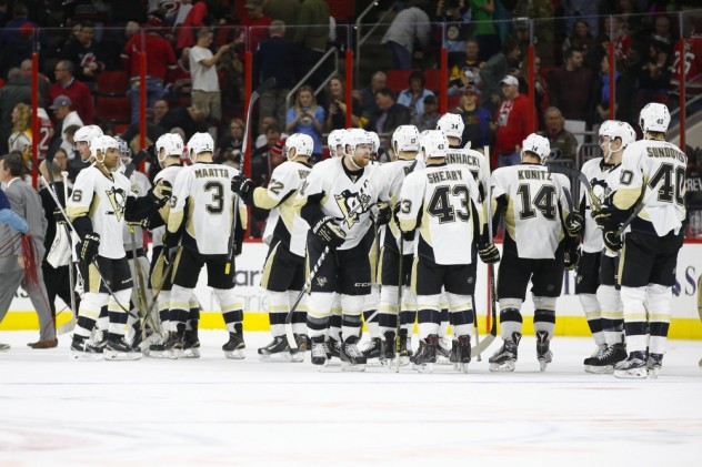 Feb 12, 2016; Raleigh, NC, USA;  Pittsburgh Penguins celebrate the shoot out win against the Carolina Hurricanes at PNC Arena. The Pittsburgh Penguins defeated the Carolina Hurricanes 2-1 in the shoot out. Mandatory Credit: James Guillory-USA TODAY Sports