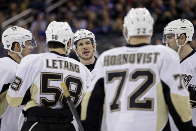 Mar 27, 2016; New York, NY, USA; Pittsburgh Penguins center Sidney Crosby (87) speaks in the direction of right wing Patric Hornqvist (72) against the New York Rangers during the third period at Madison Square Garden. The Penguins defeated the Rangers 3-2 in overtime. Mandatory Credit: Adam Hunger-USA TODAY Sports