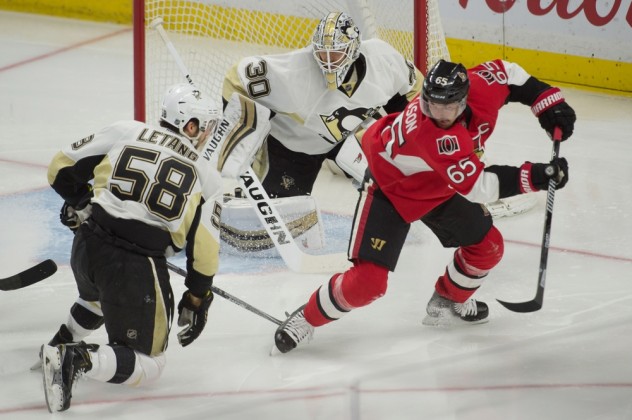 Apr 5, 2016; Ottawa, Ontario, CAN; Ottawa Senators defenseman Erik Karlsson (65) battles for postion in front of Pittsburgh Penguins goalie Matthew Murray (30) in the third period at the Canadian Tire Centre. The Penguins defeated the Senators 5-3. Mandatory Credit: Marc DesRosiers-USA TODAY Sports