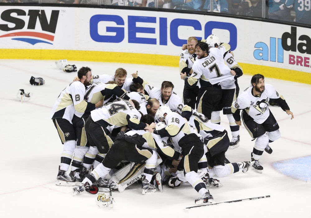 Jun 12, 2016; San Jose, CA, USA; Pittsburgh Penguins players celebrate on the ice after defeating the San Jose Sharks in game six of the 2016 Stanley Cup Final at SAP Center at San Jose. Mandatory Credit: John Hefti-USA TODAY Sports