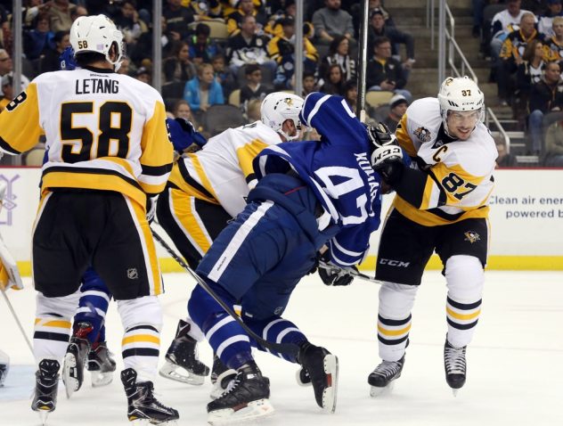Nov 12, 2016; Pittsburgh, PA, USA; Pittsburgh Penguins center Sidney Crosby (87) defends Toronto Maple Leafs center Leo Komarov (47) during the third period at the PPG Paints Arena. Pittsburgh won 4-1. Mandatory Credit: Charles LeClaire-USA TODAY Sports
