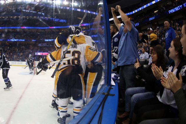 Dec 10, 2016; Tampa, FL, USA; Pittsburgh Penguins center Evgeni Malkin (71) is congratulated after he scored against the Tampa Bay Lightning during the third period at Amalie Arena. Pittsburgh Penguins defeated the Tampa Bay Lightning 4-3. Mandatory Credit: Kim Klement-USA TODAY Sports