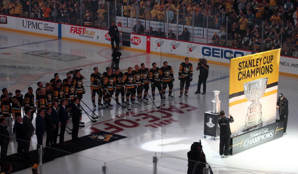 Penguins raise Stanley Cup banner