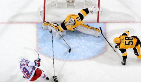 Tristan Jarry #35 of the Pittsburgh Penguins makes a save on a shot by Pavel Buchnevich #89 of the New York Rangers.